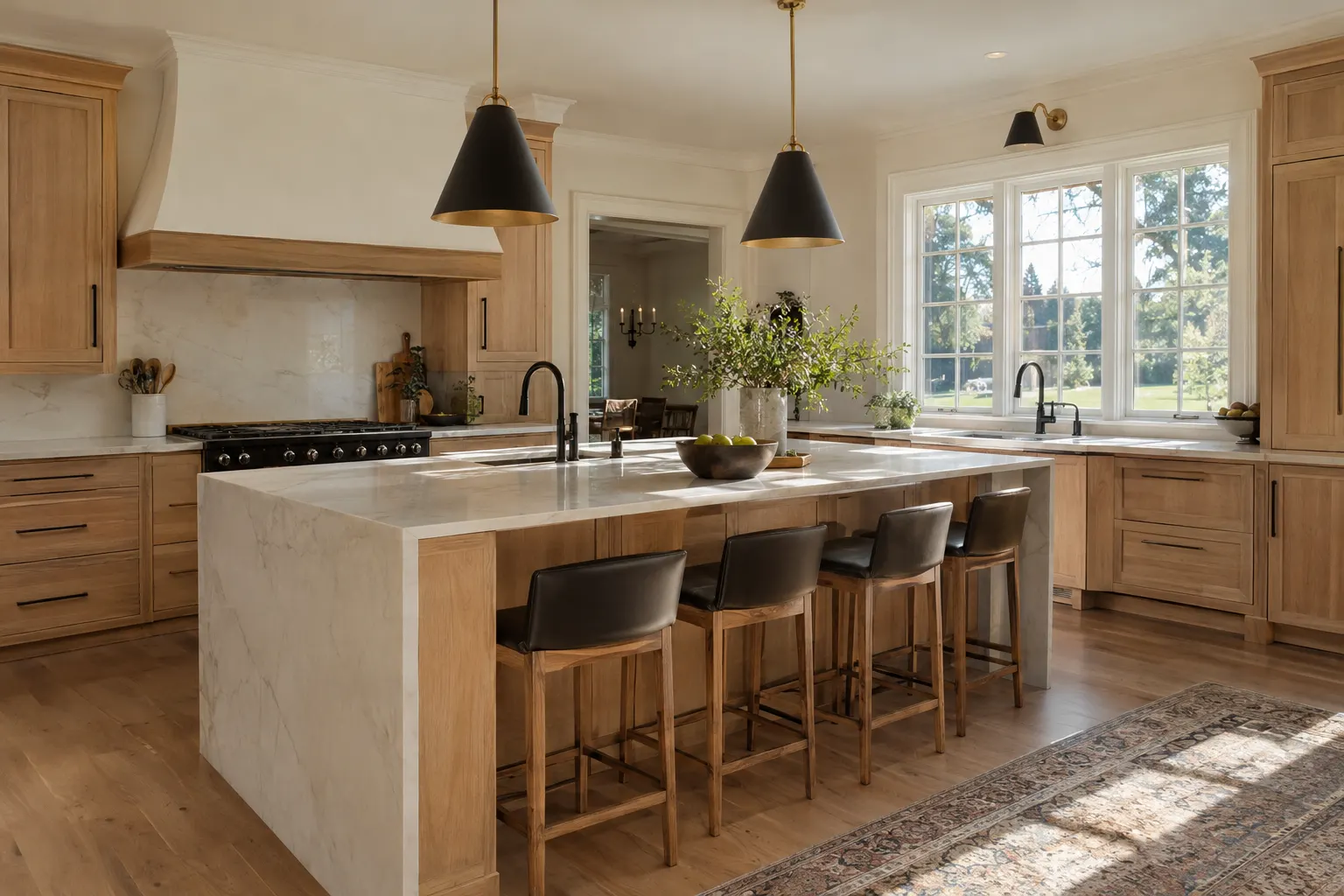 Newly remodeled kitchen with white oak cabinets and quartz island